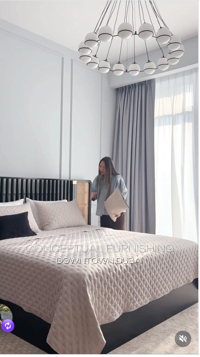 Downtown Dubai bedroom furnishing with layered pillows